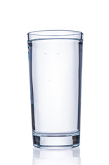 Glass with pure water on white background