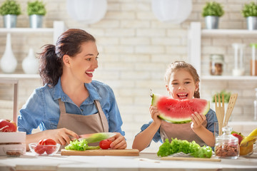 Happy family in the kitchen.
