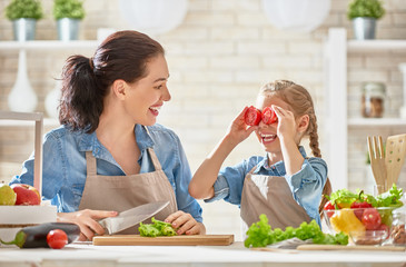 Happy family in the kitchen.