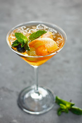 Beautiful orange cocktail Aperol Syringe with ice cubes
