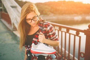 slim and sexy young women and roller skates.