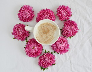 Cup of Coffee Table White Background Pink Flowers Top View Love Concept