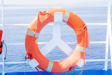 Orange rescue wheel - boat, ferry, lifebuoy