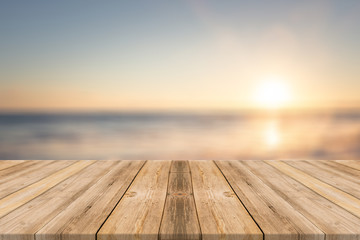 Wooden table with beach background 