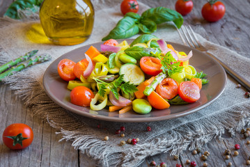 Cooked mixed vegetables on brown plate