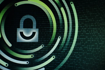 photo of computer screen display with White graphic symbol of a lock. binary numbers background. computer data protection. Internet Business Cyber security system concept