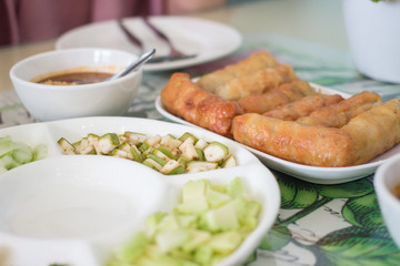 Nham nueng is vietnamese food consist of many vegetables and meatball wrapped in noodle with sauce.