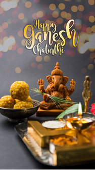 Happy Ganesh Chaturthi Greeting Card showing photograph of lord ganesha idol, pooja or puja thali, bundi laddu/modak, durva and hibiscus or jasvand flower
