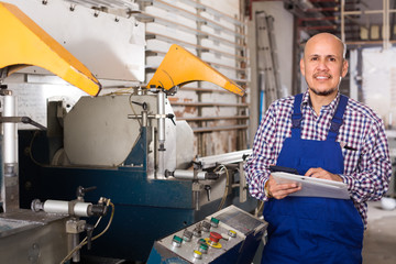 Professional worker in PVC shop.