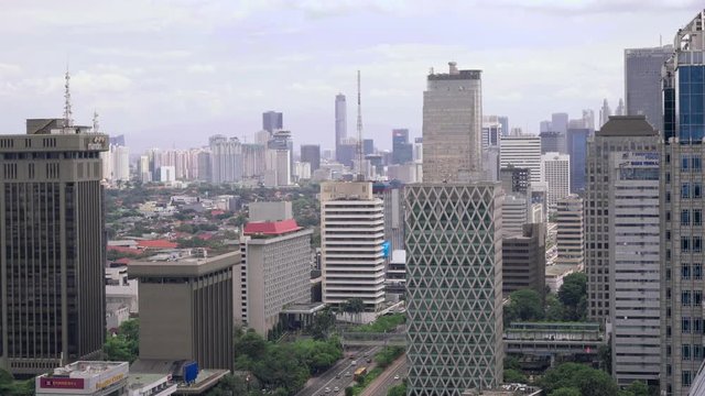 Skyscrapers in Jakarta centre, Indonesia. Shot from above with Sony a7s and Atomos Ninja Flame on cloudy day.