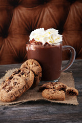 hot chocolate with cocoa and chocolate chip cookies.