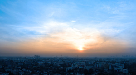 Sun rise on the sky and Bangkok city .