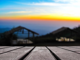 Wooden floor with blurred landscape nature view in the background