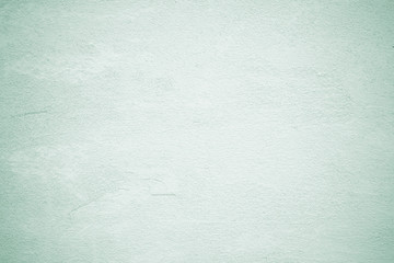 Fototapeta premium Empty green vintage grungy cement wall background texture