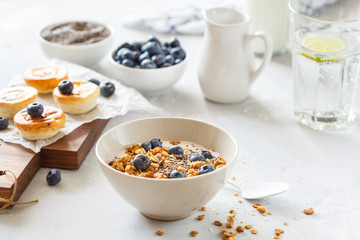 granola with yogurt and mini cheesecakes
