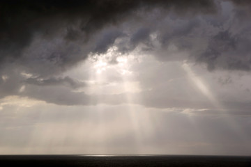 Fototapeta na wymiar Storm clouds on the sea