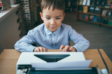 Boy with typewriter