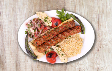 Kebab plate with bulgur and pepper