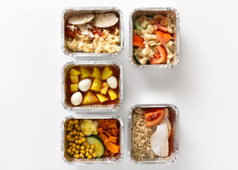 Healthy food take away in boxes on white background
