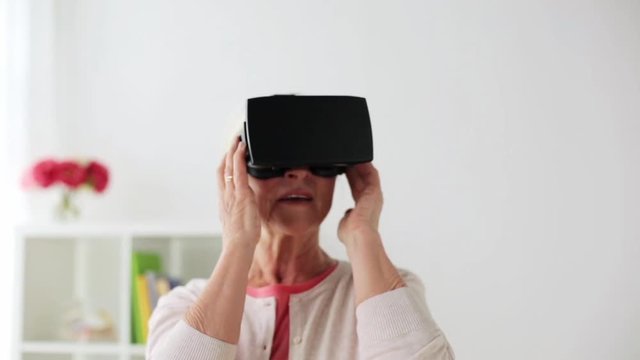 old woman in virtual reality headset or 3d glasses