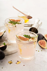 Pink fig cocktail with honey and thyme
