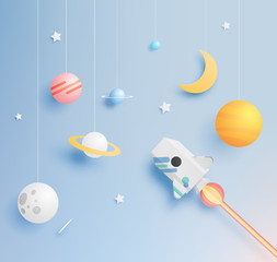 Paper rocket and solar system paper art with pastel tone background