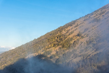 Mountain view above the cloud and blue sky. Rinjani mountain, Lombok island, Indonesia.