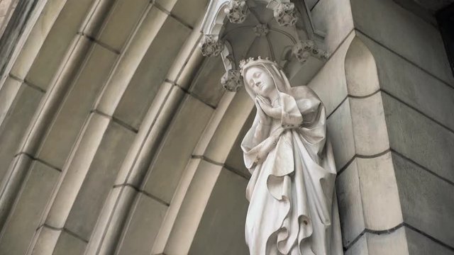 Stone statue on St. Mary of the Assumption Cathedral church in Jakarta, Indonesia. Low angle dolly slide. Shot with Sony a7s and Atomos Ninja Flame