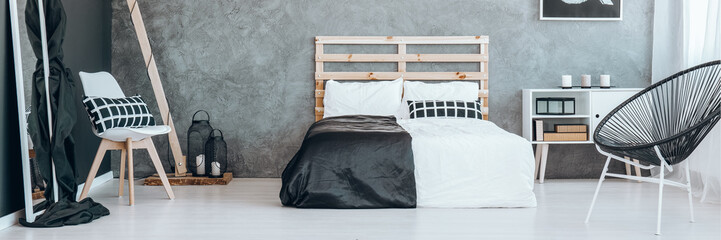 Fototapeta na wymiar Black and white minimalist bedroom
