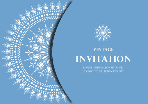 invitation card vintage design with white lace mandala pattern on blue background vector - Powered by Adobe