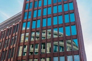 red brick building with long and small windows