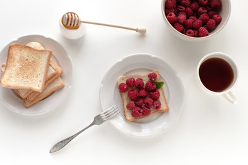 toasts with raspberries for breakfast