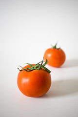 Ripe tomato over white background