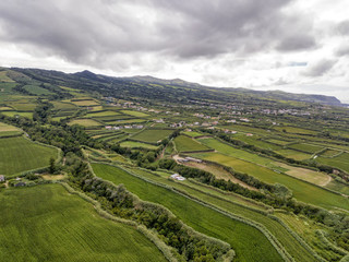 Aerial view of fields and houses near the small village of Ginetes on Azorean island of Sao Miguel in Portugal.