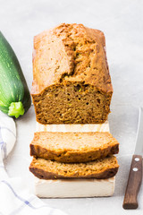 Gluten free zucchini spiced bread on concrete background. Banana bread on concrete, slate or stone background.