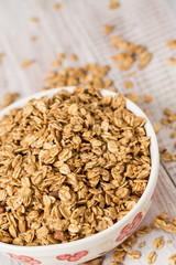 Bowl Of Almond Breakfast Granola Close Up Vertical