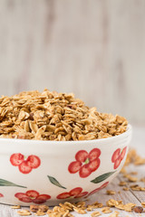 Granola Breakfast Cereal In Floral Bowl