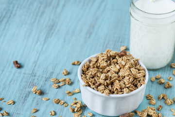 Almond Breakfast Cereal Granola With Glass of Milk Close Up