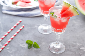 Watermelon cocktail with lemon and mint. Refreshing lemonade close up