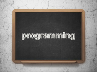 Database concept: Programming on chalkboard background