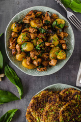 Potato pancakes, fried chicken with potatoes