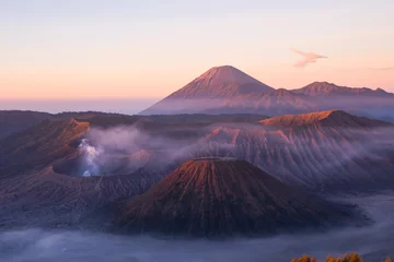 Tuinposter Mount Bromo volcano during sunrise, the magnificent view of Mt.Bromo located in Bromo Tengger Semeru National Park, East Java, Indonesia, Kingkong Hill viewpoint, Penajakan   © mnonchan