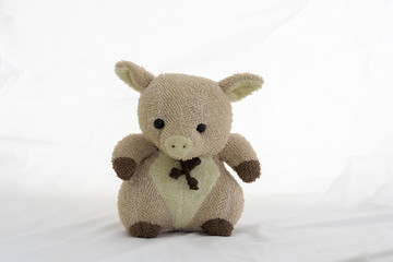 Pink pig animal doll on white background