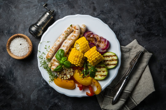 Barbeque sausages with vegetables