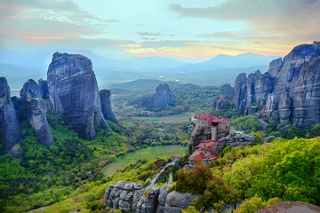 Fototapeten Meteora is included in the UNESCO World Heritage Site. Meteora is a big monastery complex including nine reserved monastery built on top of difficult high cliffs resembling stone pillars. © Pencho Tihov