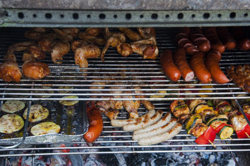 some sausages, poultry, shashlik grilled on a barbeque