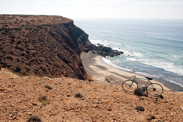 Fototapeta na wymiar Bicycle on the Atlantic Ocean coast