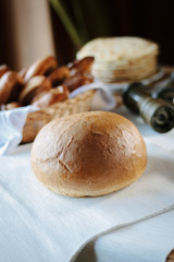 Fresh and hot bread on table