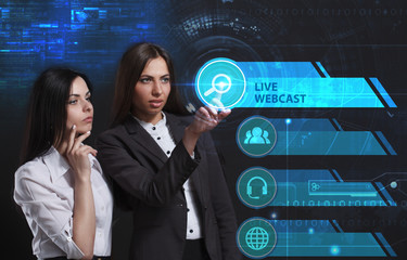 The concept of business, technology, the Internet and the network. A young entrepreneur working on a virtual screen of the future and sees the inscription: Live webcast