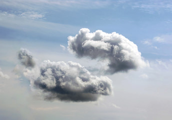 Pair of Cumulus clouds, Finland